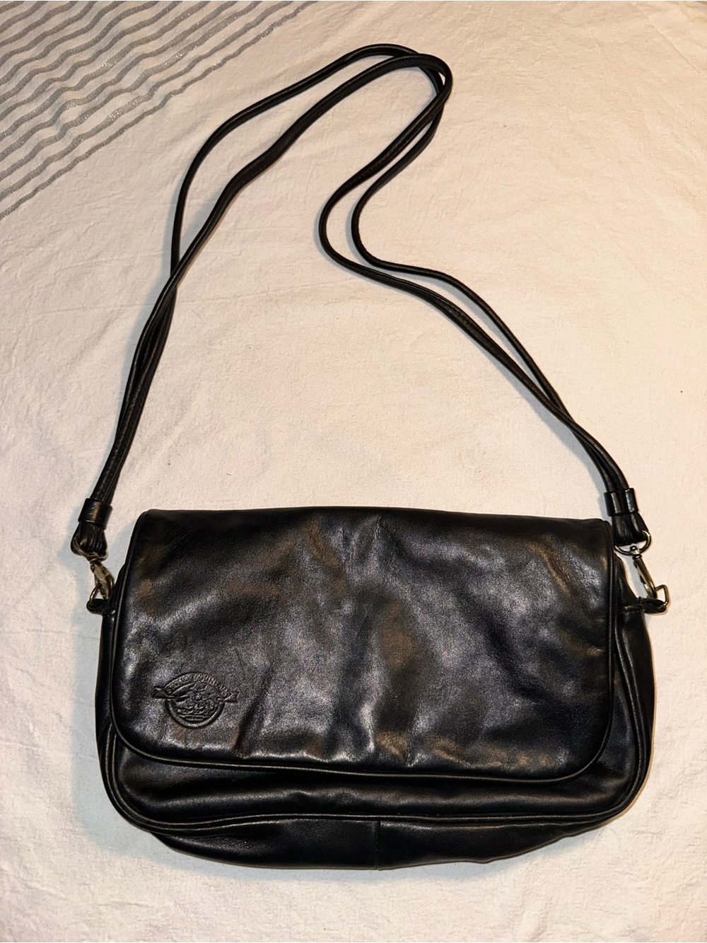 Stone Mountain Classic Black Leather Crossbody with Embossed Detail